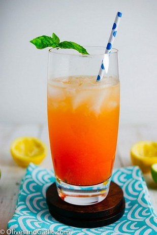 Muddled Orange & Strawberry Tequila Fizz